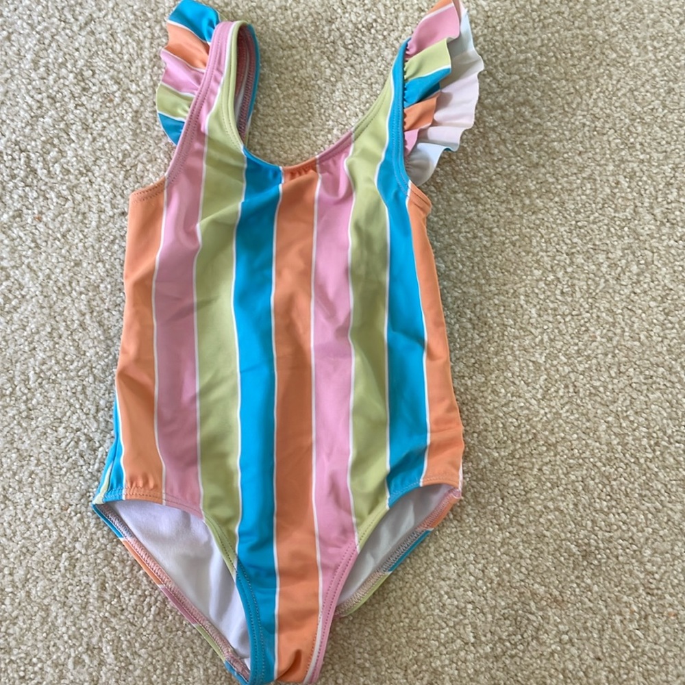 Roxy one piece bathing suit. Multi colors, girls size 4.
